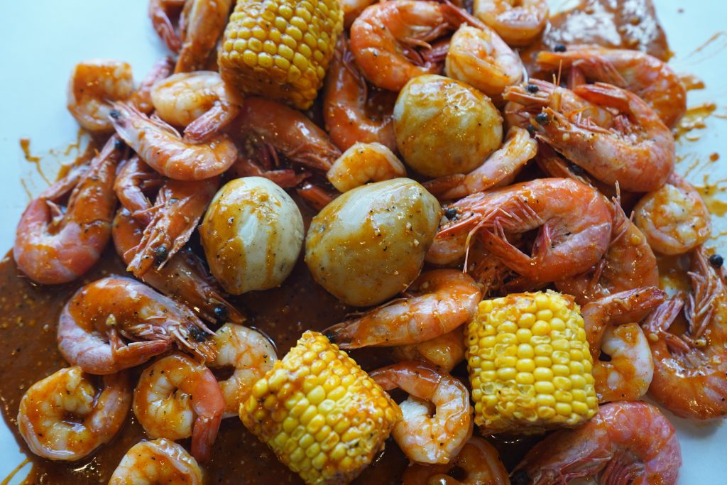 Seafood feast with Mixed Prawn Bag and sides at Kickin’Inn
