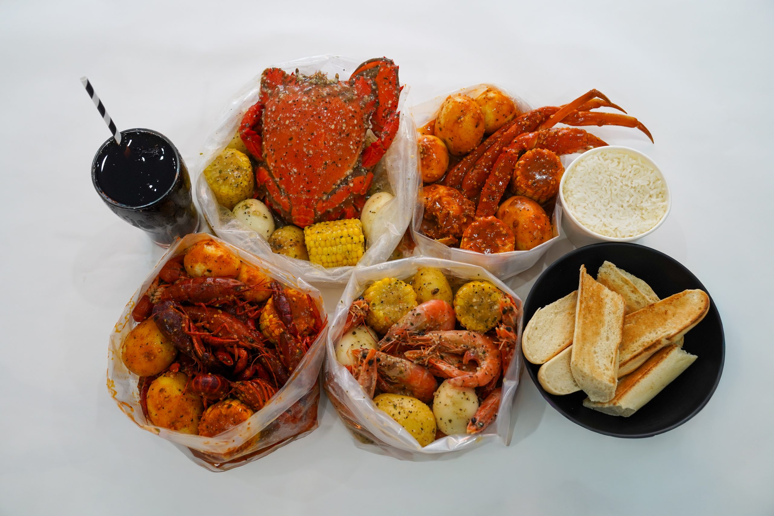 Kickin’Inn Whole Spanner Crab Crawfish Snow Crab and Fresh Prawn Value Deals
